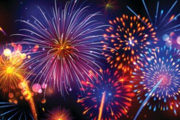 a group of fireworks in the night sky