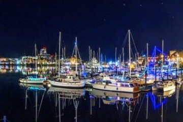 a boat docked at night